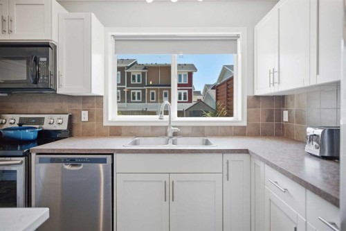167 Auburn Bay Boulevard Se, Calgary, AB - Indoor Photo Showing Kitchen With Double Sink