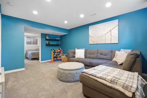 167 Auburn Bay Boulevard Se, Calgary, AB - Indoor Photo Showing Living Room