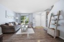 167 Auburn Bay Boulevard Se, Calgary, AB  - Indoor Photo Showing Living Room 