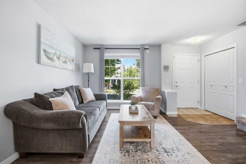 167 Auburn Bay Boulevard Se, Calgary, AB - Indoor Photo Showing Living Room