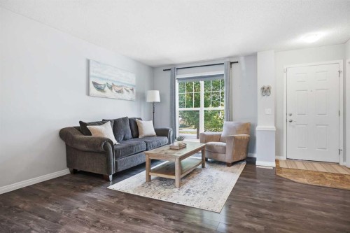167 Auburn Bay Boulevard Se, Calgary, AB - Indoor Photo Showing Living Room