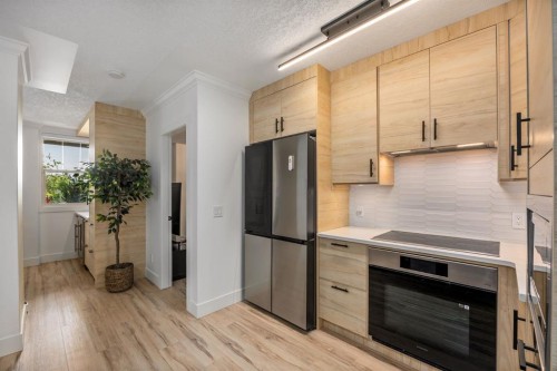 106-59 22 Avenue Sw, Calgary, AB - Indoor Photo Showing Kitchen With Stainless Steel Kitchen