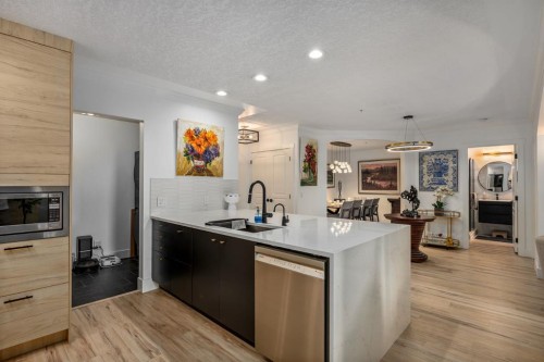 106-59 22 Avenue Sw, Calgary, AB - Indoor Photo Showing Kitchen With Upgraded Kitchen