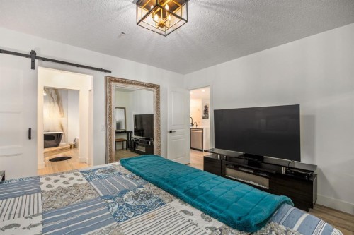 106-59 22 Avenue Sw, Calgary, AB - Indoor Photo Showing Bedroom