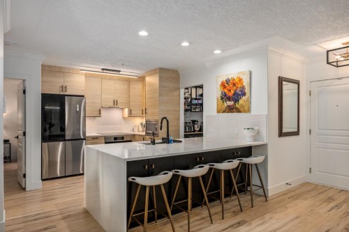 106-59 22 Avenue Sw, Calgary, AB - Indoor Photo Showing Kitchen With Stainless Steel Kitchen With Upgraded Kitchen