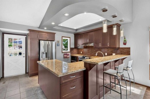 31 Scenic Cove Place Nw, Calgary, AB - Indoor Photo Showing Kitchen With Upgraded Kitchen