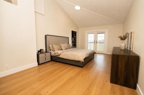 250257 Conrich Road, Rural Rocky View County, AB - Indoor Photo Showing Bedroom