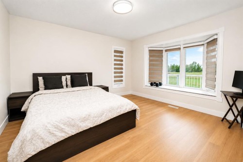 250257 Conrich Road, Rural Rocky View County, AB - Indoor Photo Showing Bedroom