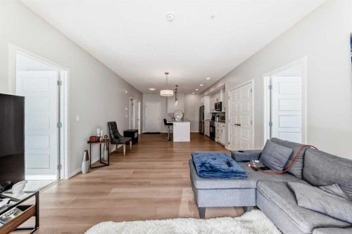 4414-550 Belmont Street Sw, Calgary, AB - Indoor Photo Showing Living Room