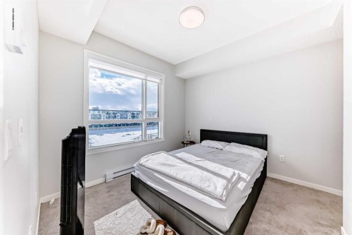 4414-550 Belmont Street Sw, Calgary, AB - Indoor Photo Showing Bedroom