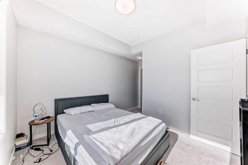 4414-550 Belmont Street Sw, Calgary, AB - Indoor Photo Showing Bedroom