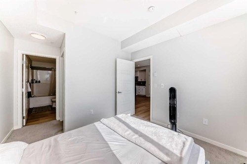 4414-550 Belmont Street Sw, Calgary, AB - Indoor Photo Showing Bedroom