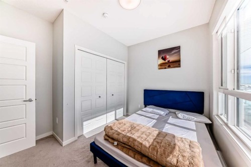 4414-550 Belmont Street Sw, Calgary, AB - Indoor Photo Showing Bedroom