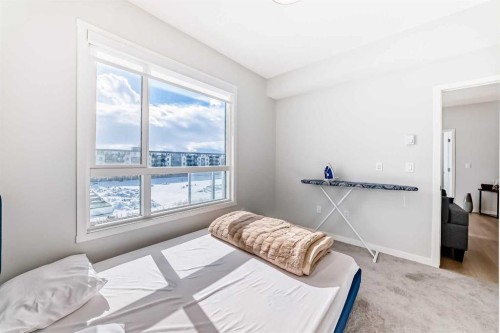 4414-550 Belmont Street Sw, Calgary, AB - Indoor Photo Showing Bedroom