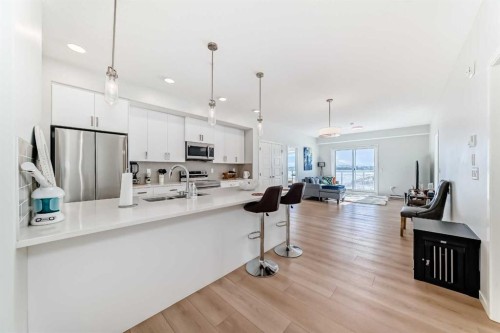 4414-550 Belmont Street Sw, Calgary, AB - Indoor Photo Showing Kitchen With Stainless Steel Kitchen With Upgraded Kitchen