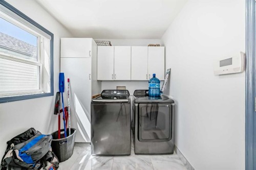 382 Cove Road, Chestermere, AB - Indoor Photo Showing Laundry Room