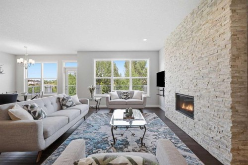 190 Riviera View, Cochrane, AB - Indoor Photo Showing Living Room With Fireplace