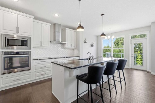 190 Riviera View, Cochrane, AB - Indoor Photo Showing Kitchen With Stainless Steel Kitchen With Upgraded Kitchen
