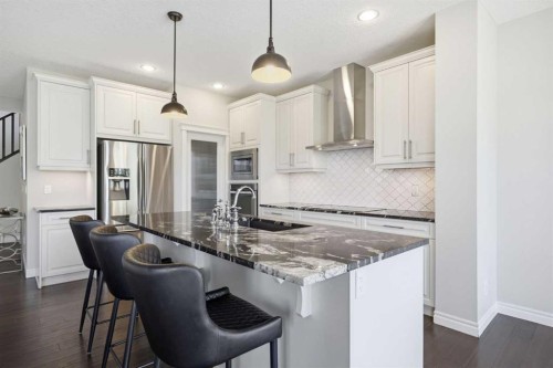 190 Riviera View, Cochrane, AB - Indoor Photo Showing Kitchen With Stainless Steel Kitchen With Upgraded Kitchen