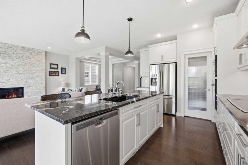 190 Riviera View, Cochrane, AB - Indoor Photo Showing Kitchen With Stainless Steel Kitchen With Upgraded Kitchen