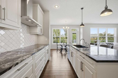 190 Riviera View, Cochrane, AB - Indoor Photo Showing Kitchen With Upgraded Kitchen