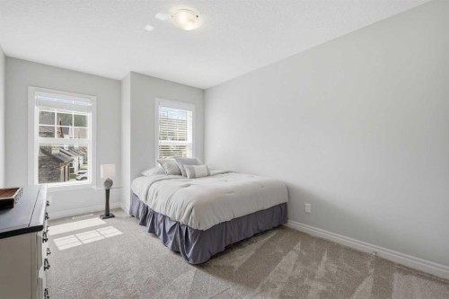190 Riviera View, Cochrane, AB - Indoor Photo Showing Bedroom