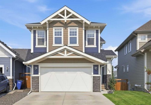 190 Riviera View, Cochrane, AB - Outdoor With Facade