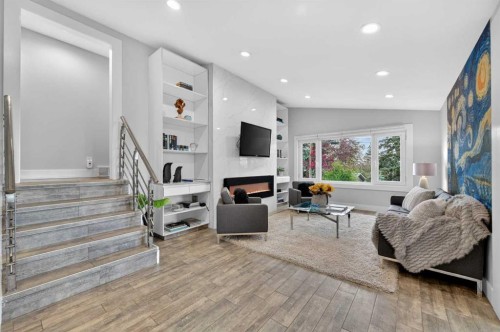11 Selkirk Drive Sw, Calgary, AB - Indoor Photo Showing Other Room With Fireplace