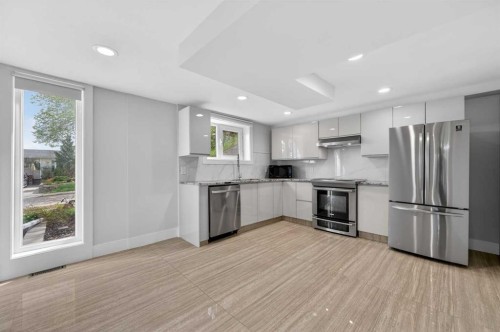 11 Selkirk Drive Sw, Calgary, AB - Indoor Photo Showing Kitchen With Stainless Steel Kitchen With Upgraded Kitchen