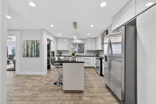 11 Selkirk Drive Sw, Calgary, AB - Indoor Photo Showing Kitchen With Stainless Steel Kitchen With Upgraded Kitchen