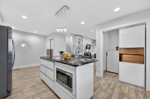 11 Selkirk Drive Sw, Calgary, AB - Indoor Photo Showing Kitchen With Upgraded Kitchen