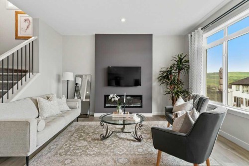 363 Precedence Hill, Cochrane, AB - Indoor Photo Showing Living Room