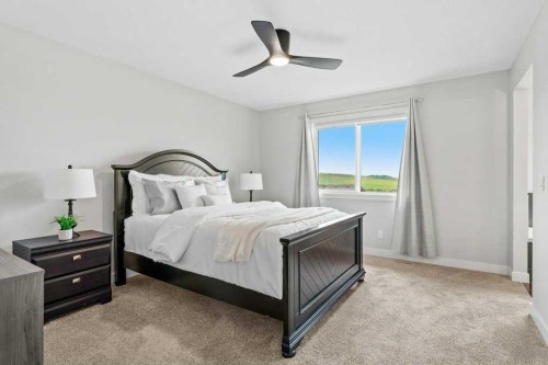 363 Precedence Hill, Cochrane, AB - Indoor Photo Showing Bedroom