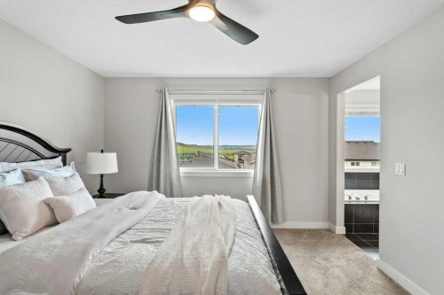 363 Precedence Hill, Cochrane, AB - Indoor Photo Showing Bedroom