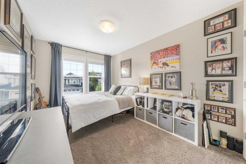 219 Auburn Springs Close Se, Calgary, AB - Indoor Photo Showing Bedroom
