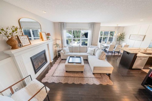 219 Auburn Springs Close Se, Calgary, AB - Indoor Photo Showing Living Room With Fireplace