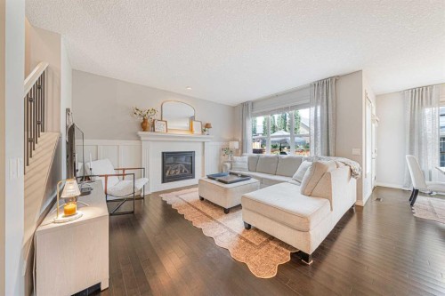 219 Auburn Springs Close Se, Calgary, AB - Indoor Photo Showing Living Room With Fireplace