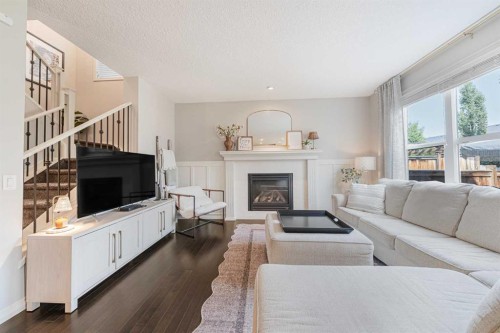 219 Auburn Springs Close Se, Calgary, AB - Indoor Photo Showing Living Room With Fireplace
