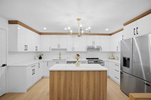 300 Edgehill Drive Nw, Calgary, AB - Indoor Photo Showing Kitchen With Stainless Steel Kitchen With Double Sink With Upgraded Kitchen
