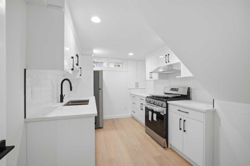 300 Edgehill Drive Nw, Calgary, AB - Indoor Photo Showing Kitchen With Double Sink With Upgraded Kitchen