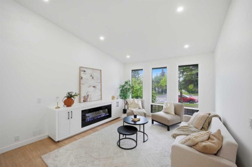300 Edgehill Drive Nw, Calgary, AB - Indoor Photo Showing Living Room With Fireplace