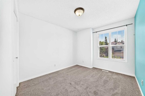 708 Tuscany Drive Nw, Calgary, AB - Indoor Photo Showing Other Room