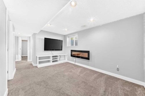 708 Tuscany Drive Nw, Calgary, AB - Indoor With Fireplace