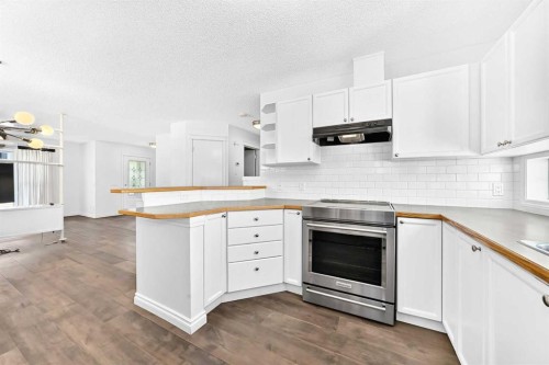 708 Tuscany Drive Nw, Calgary, AB - Indoor Photo Showing Kitchen