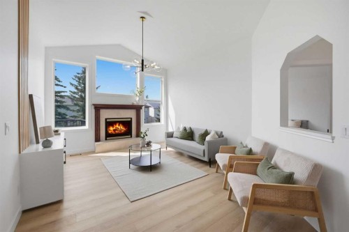 47 Citadel Ridge Close Nw, Calgary, AB - Indoor Photo Showing Living Room With Fireplace