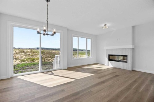 149 Creekside Street Sw, Calgary, AB - Indoor Photo Showing Living Room With Fireplace