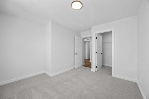 149 Creekside Street Sw, Calgary, AB - Indoor Photo Showing Other Room