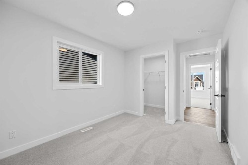 149 Creekside Street Sw, Calgary, AB - Indoor Photo Showing Other Room