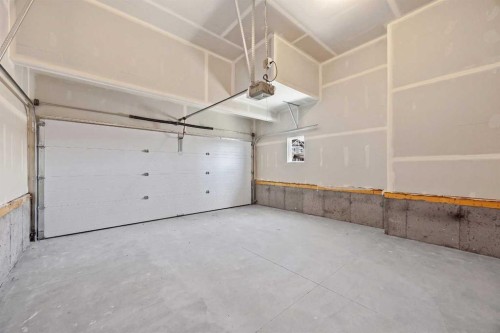 149 Creekside Street Sw, Calgary, AB - Indoor Photo Showing Garage