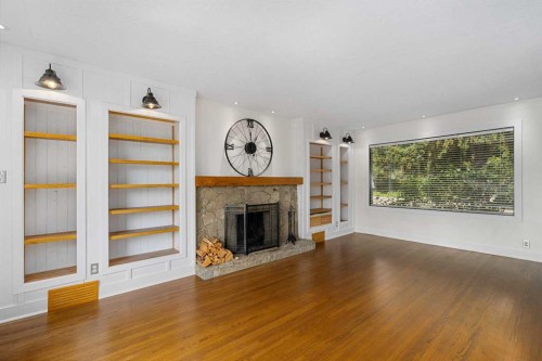 119 Coleridge Road Nw, Calgary, AB - Indoor Photo Showing Living Room With Fireplace